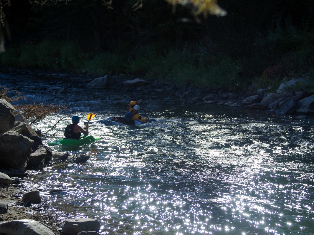 ASC volunteer kayakers on the Gallatin River